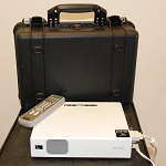 Case with projector and remote control