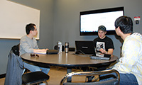 newly-painted group study room with whiteboard and monitor