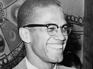 Photo of Malcolm X smiling
