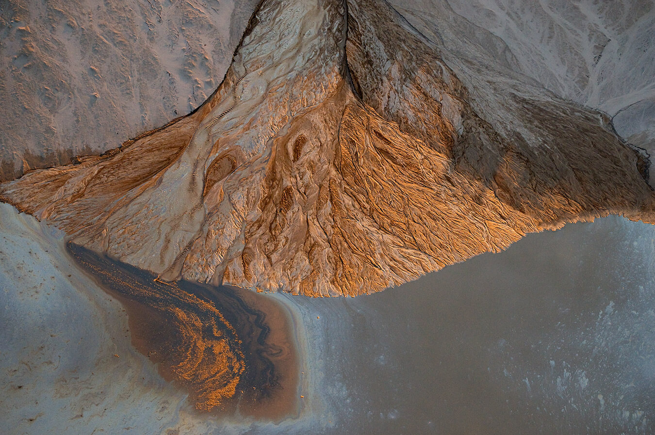Image credit: Alluvial Fan, Albian Sands, Muskeg River Mine, Fort McKay, Alberta, Canada (B2401546), by Louis Helbig. 