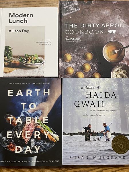 four books on the table including stories of Iroquois, Sto:lo, and Cherokee