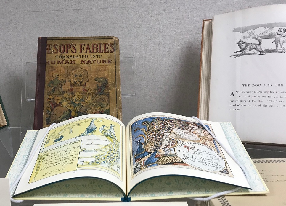 photo of illustrated books exhibit including Aesop's fables