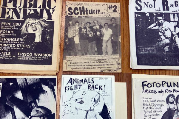 Six different punk zines from the 1980s to 1990s: Public Enemy, SCHtuff..., Snot Rag, Ken Lester's Poetry, Animals Fight Back! and FotoPunk.