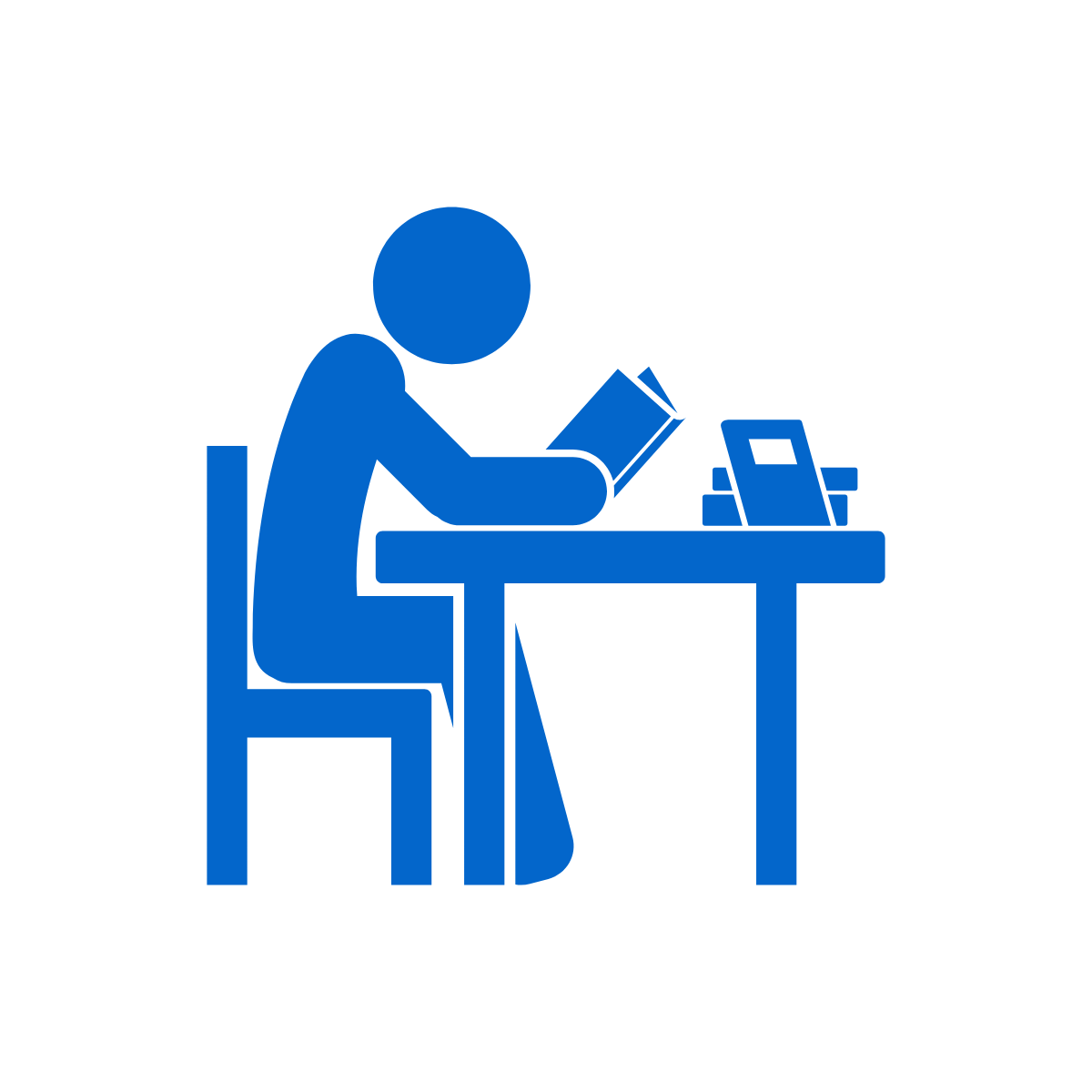 line drawing of a person reading a book at a desk