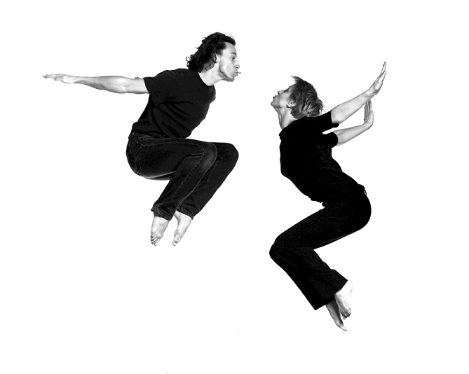 Performers jumping in Kiss presentation