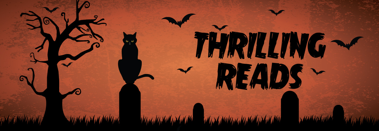 Thrilling Reads book display silhouette of a graveyard scene with headstones, bare tree, bats, and black cat
