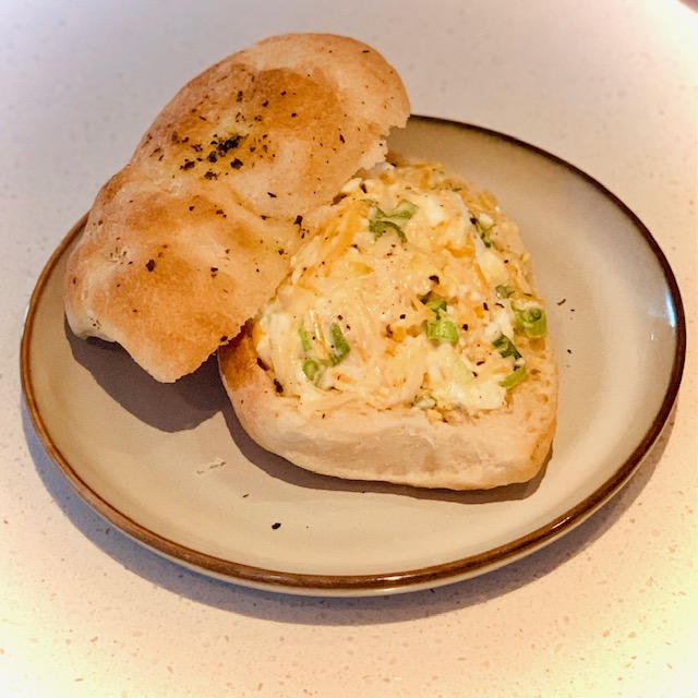 Picture of the best lunch in the world: Mark's boiled egg sandwich on a Turkish bun.