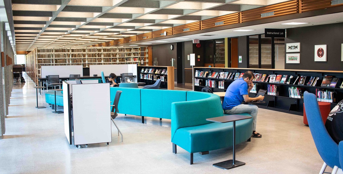 Image showing the ICRC space including the media centre, couches, and bookcases.