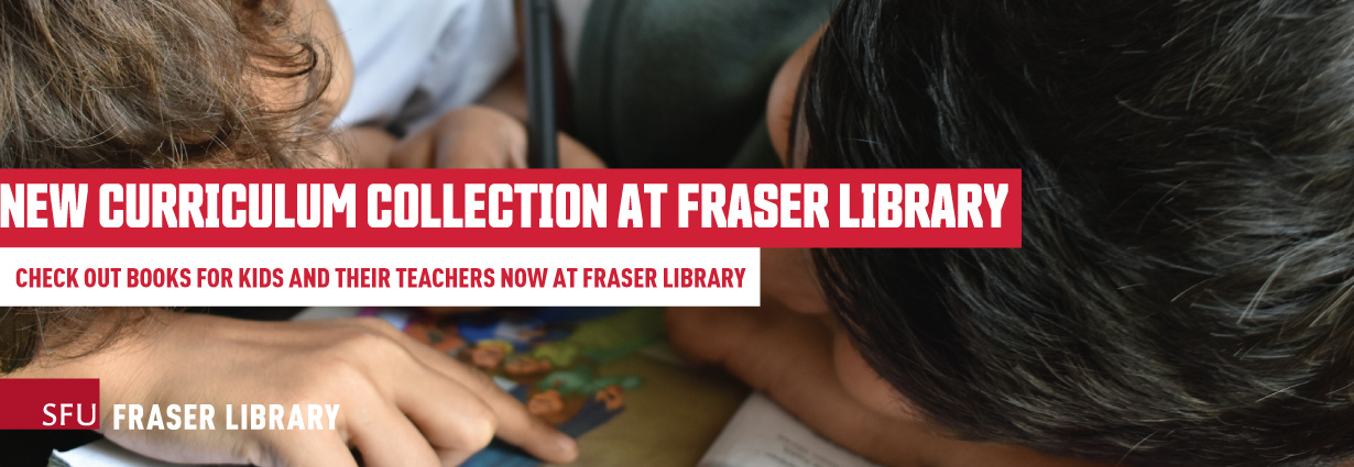 New Curriculum Collection at Fraser Library Two children bend over an open picture book