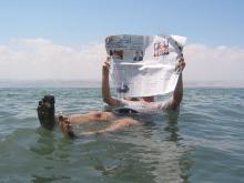 Source: https://commons.wikimedia.org/wiki/File:Dead_sea_newspaper.jpg ""
