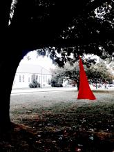 Red dress displays like the one photographed here have become powerful symbols of the genocide of missing and murdered Indigenous women and girls across Canada